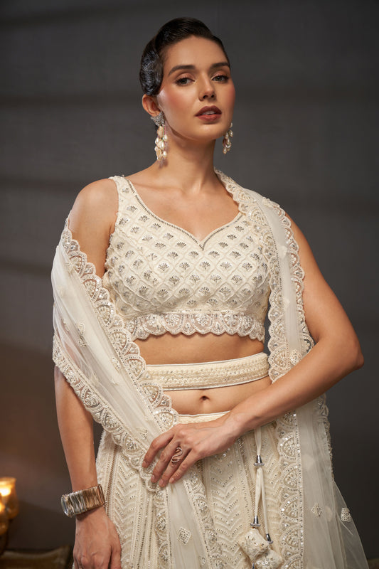 Sequins Work Cream Embroidered Net Lehenga Choli