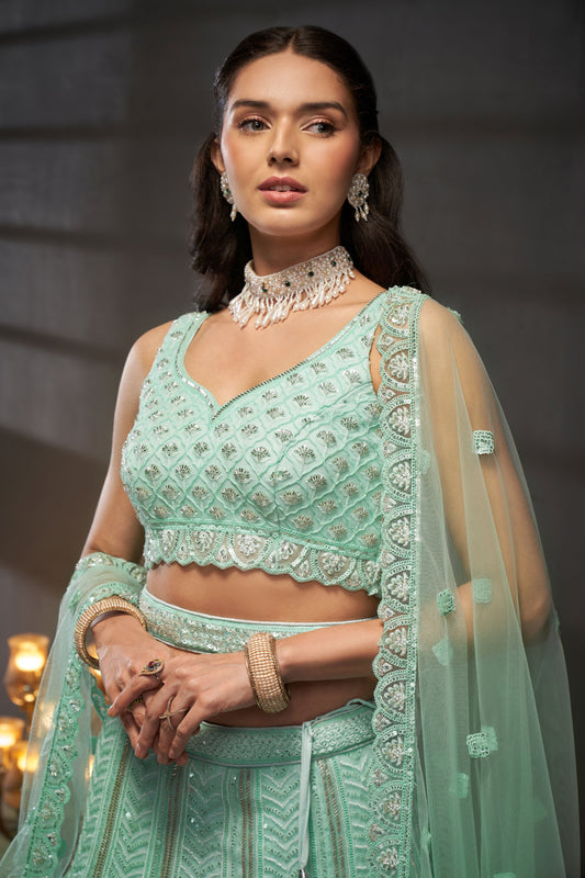 Sequins Work Turquoise Embroidered Net Lehenga Choli