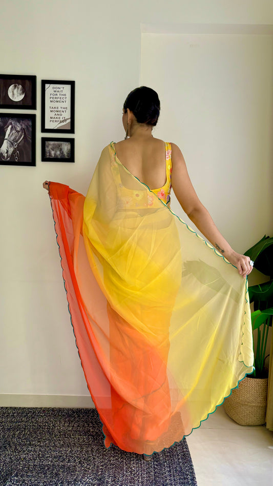 Yellow and Orange Georgette Saree With Fancy Arco Border Work